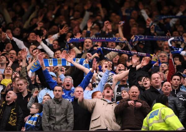 Pompey fans celebrate success at Old Trafford in 2008. Picture: Steve Reid