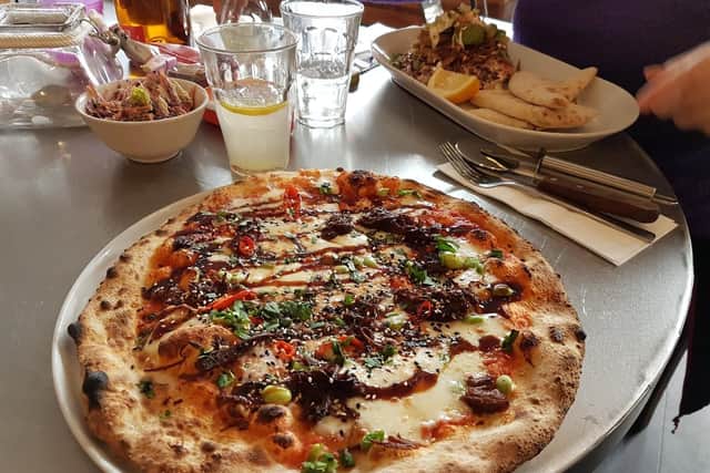 Large and fresh, the pizza-of-the-day.