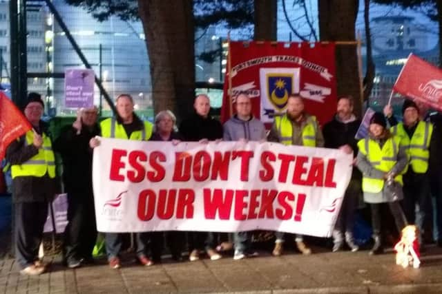 Protesters gather at the Royal Navy rugby match yesterday