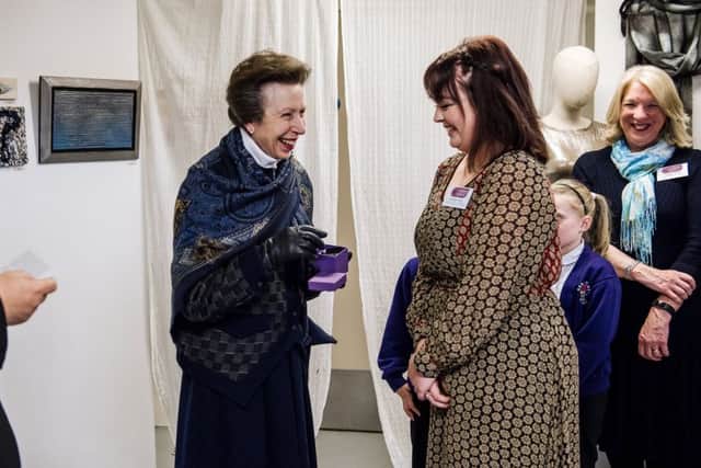 Making Space young designer Isobel Haly,16, presents the Princess Royal with a hand-crafted tin brooch  Picture: Tom Langford