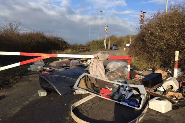 Rubbish has been flytipped at the top of Gillman Road where it meets Portsdown Hill Road, blocking pedestrian and cyclist access