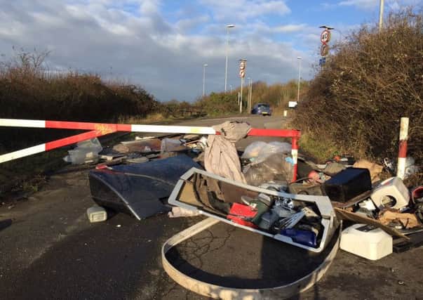 Rubbish has been flytipped at the top of Gillman Road where it meets Portsdown Hill Road, blocking pedestrian and cyclist access