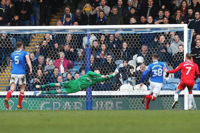Lee Martin scored twice in Gillingham's win at Fratton Park