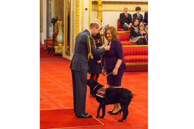 Lisa Baldock from Fratton is made an MBE by the Duke of Cambridge at Buckingham Palace Picture: Dominic Lipinski/PA Wire