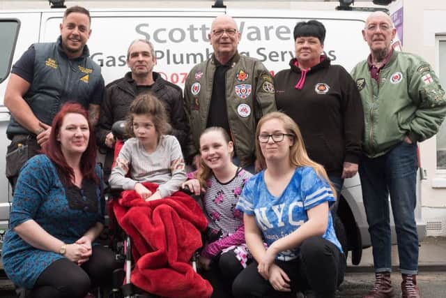 Back row, Scott Ware, Colin England, Keith and Karen Thripp, Pete Glover. Front row, Zoe England with children Alyssa, Kimberly and Kealie
Picture: Keith Woodland