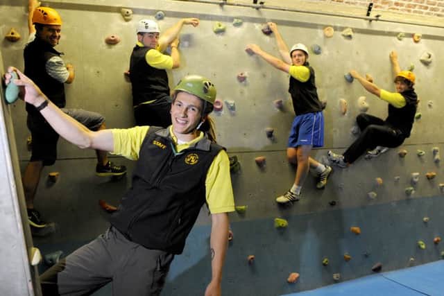 Having a rock-climbing session at the Peter Ashley Activity Centre at Fort Purbrook
Picture: Allan Hutchings (131787-756)