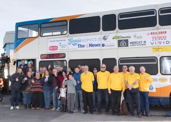 Robert Dolling Project volunteers celebrate the launch of the Homeless Bus. Credit: Keith Woodland