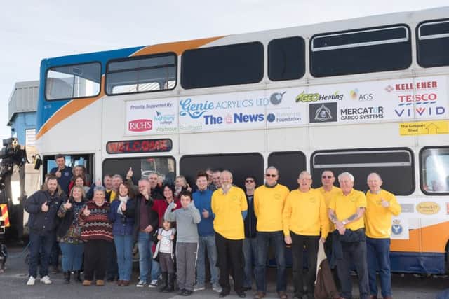Robert Dolling Project volunteers celebrate the launch of the Homeless Bus. Credit: Keith Woodland