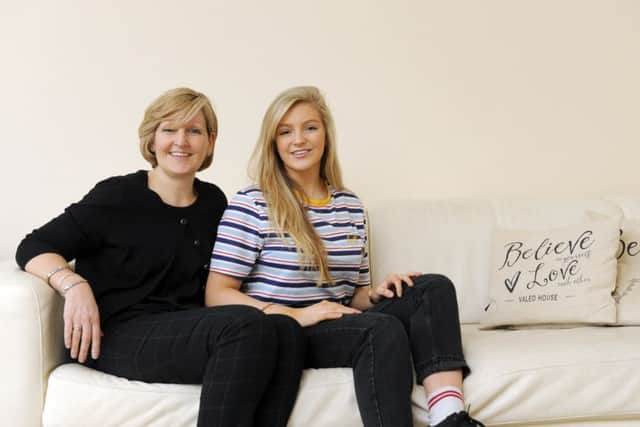 Jess Ridge, 17, with mum Lara at their home in Hambledon Picture by: Malcolm Wells (180307-9612)