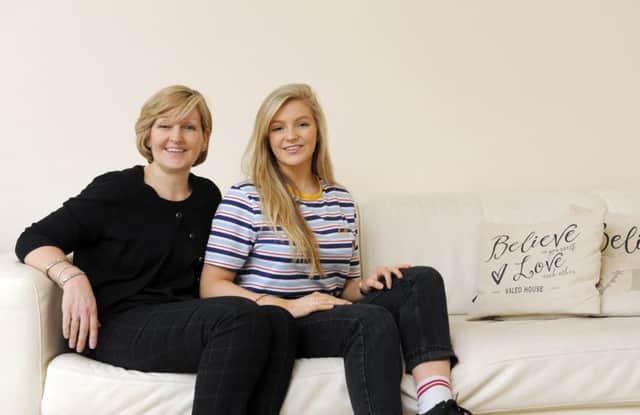 Jess Ridge, 17, with mum Lara at their home in Hambledon Picture by: Malcolm Wells (180307-9612)