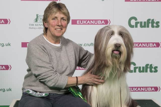 Marilyn Baker with Braidy, a Bearded Collie.