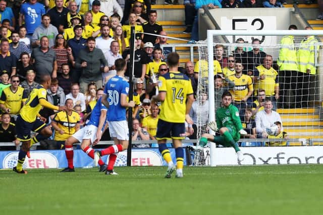 Gino van Kessel scores for Oxford United in their 3-0 win over Pompey in August. Picture: Joe Pepler