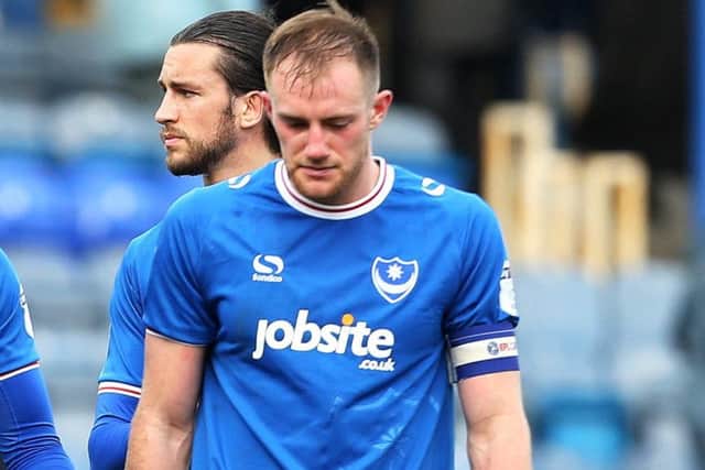 Pompey stand-in skipper Matt Clarke looks dejected following Saturdays defeat to Gillingham