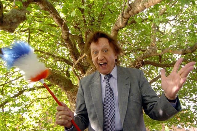 Comedian Ken Dodd outside the Royal Shakespeare Company (RSC) in Stratford-upon-Avon. Picture: David Jones/PA