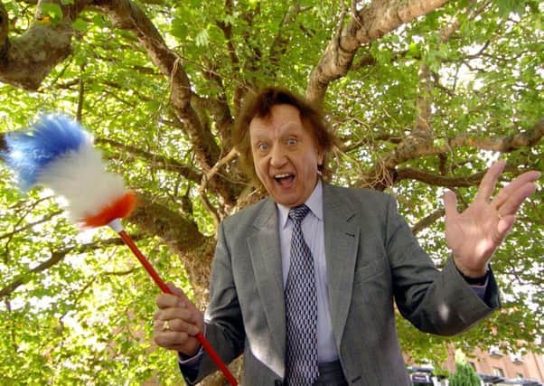 Comedian Ken Dodd outside the Royal Shakespeare Company (RSC) in Stratford-upon-Avon. Picture: David Jones/PA