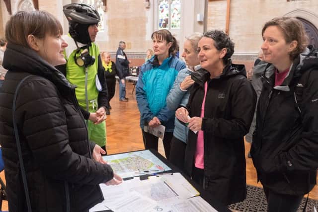 Members of the Friends of the Earth discuss the quality of air in Portsmouth with visitors to the For the Love of Portsmouth event        Picture: Keith Woodland