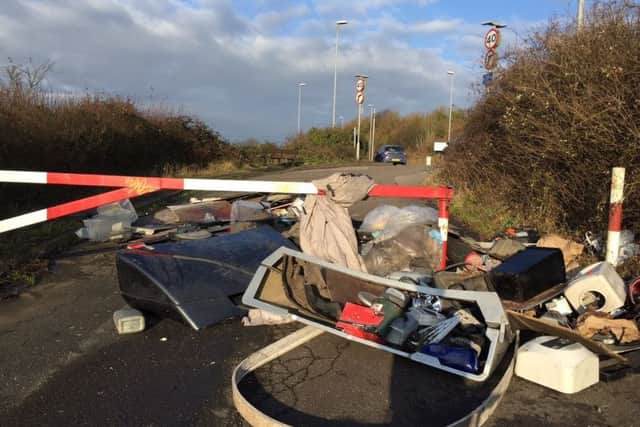 Rubbish has been flytipped at the top of Gillman Road where it meets Portsdown Hill Road, blocking pedestrian and cyclist access.