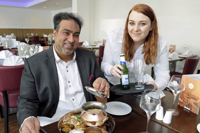 Ruhan Karim and staff member Betheny Oliver at India Quay at Port Solent Picture: Ian Hargreaves