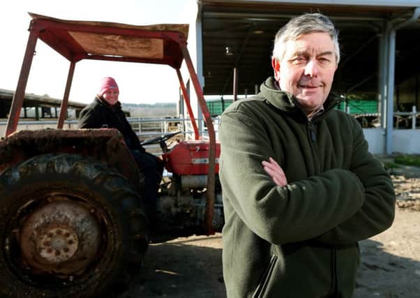 Hampshire NFU chairman Andrew Malyon, dairy farmer, pictured with his daughter, Sarah, at his farm, Goathouse Farm, North Boarhunt, Fareham. Picture: Chris Moorhouse