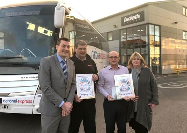 Coach firm goes for gold
David James (National Express), Mark Jordan and Dave Allen of Lucketts and Janet Burke (National Express)