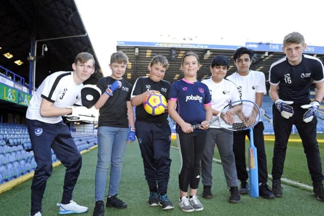 Youngsters at Fratton Park. From left - Owen Reville (18), Joe Wallace (13), Albie Mullins (14), Angel Kerman (eight), Fareed Sahaq (12), and his brother Assad (16), and Jaydon Ridout (15).
Picture by Ian Hargreaves (180213-1)