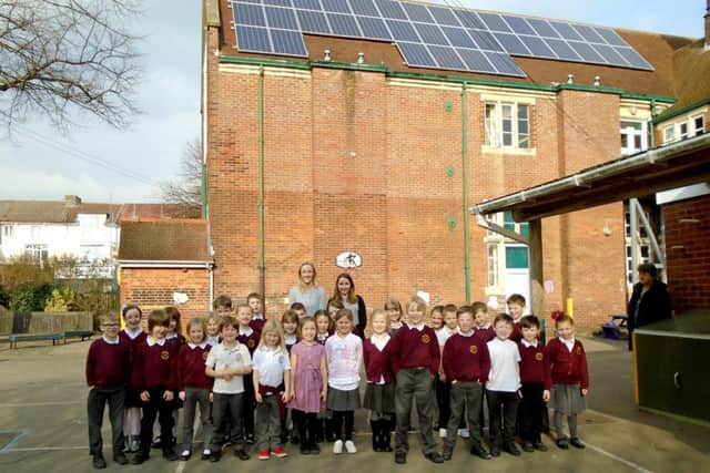 Pupils at Southsea Infant School with their solar panels