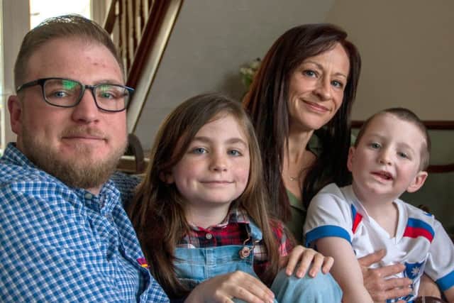 Harry, right, with father Cairan, sister Emonie and mother Fiona    Picture: Phil Burner