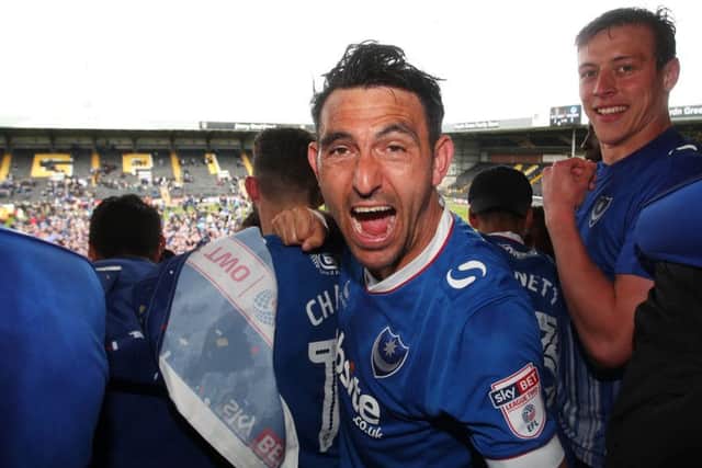 Gary Roberts celebrates Pompey's promotion from League Two at Notts County. Picture: Joe Pepler