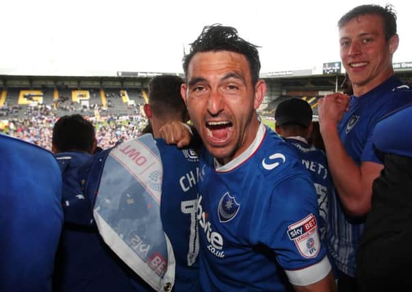 Gary Roberts celebrates Pompey's promotion from League Two at Notts County. Picture: Joe Pepler