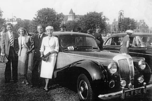 Elegantly-dressed members of Southsea Motor Club on Southsea Common in 1952