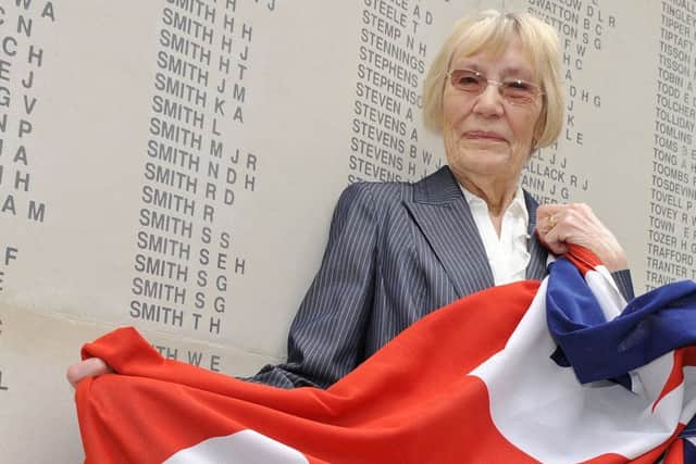 Jean Louth at the war memorial she campaigned for      Picture: Malcolm Wells (160906-5240)