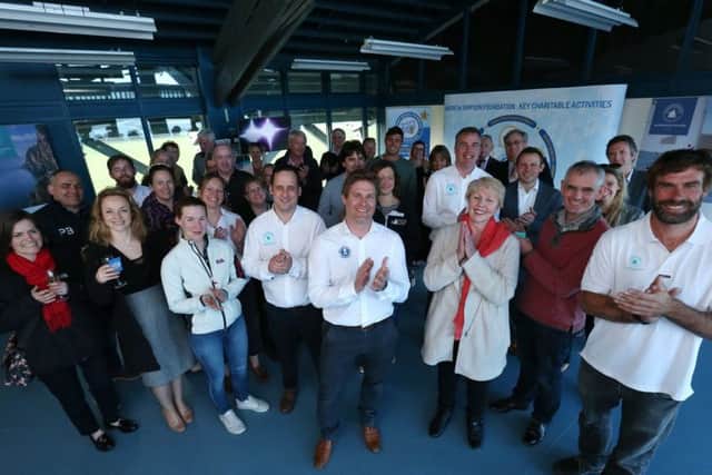 People gathered for the renaming of the Andrew Simpson Watersports Centre, including trustee Iain Percy, right. Picture: Chris Moorhouse