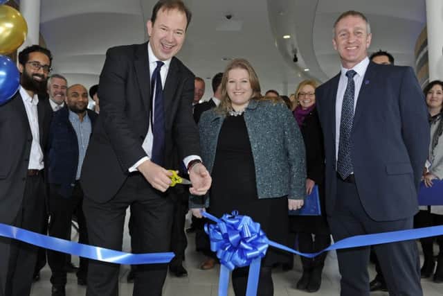 Transport Minister Jesse Norman MP opens the new Hard Interchange at Portsmouth assisted by Donna Jones and Councillor Simon Bosher of Portsmouth City Council     Picture Ian Hargreaves  (180221-1)