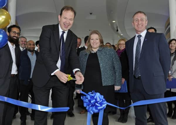 Transport Minister Jesse Norman MP opens the new Hard Interchange at Portsmouth assisted by Donna Jones and Councillor Simon Bosher of Portsmouth City Council     
Picture Ian Hargreaves  (180221-1)