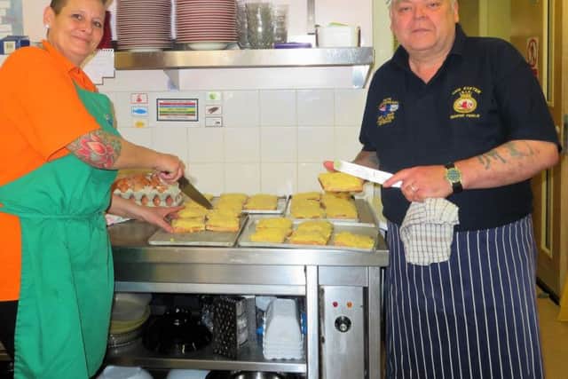 Tracy Audin and Robbie Ware cooking the cheesy hammy eggies for the armed forces veterans