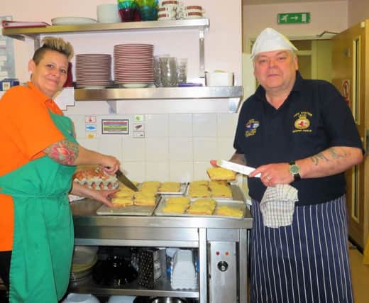 Tracy Audin and Robbie Ware cooking the cheesy hammy eggies for the armed forces veterans