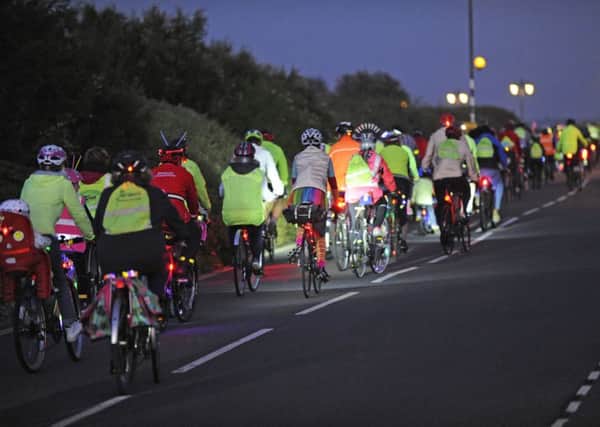 Cyclists from across the Portsmouth area take part in the Glow cycling event in Southsea. 
Picture Ian Hargreaves  (171233-1)