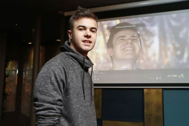 Lewis Hine pictured in front of a screen playing his CBBC documentary. Credit: Habibur Rahman