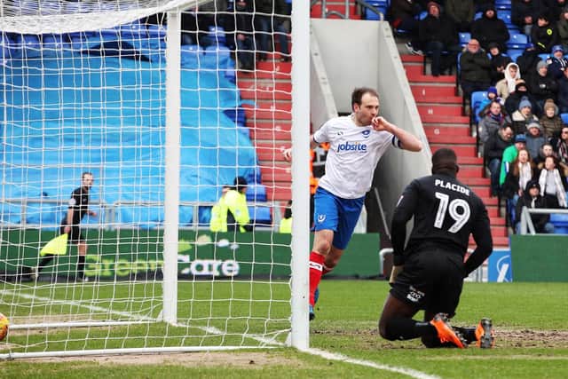 Brett Pitman celebrates after putting Pompey 1-0 up at Boundary Park