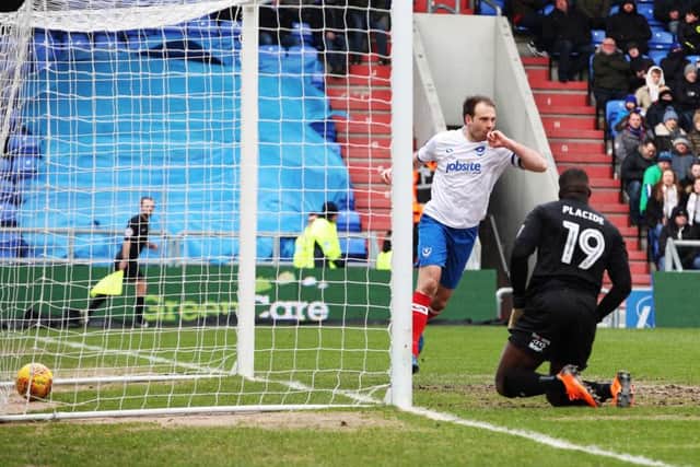 Brett Pitman scores his first goal in Pompey's match at Oldham. Picture: Joe Pepler/Digital South