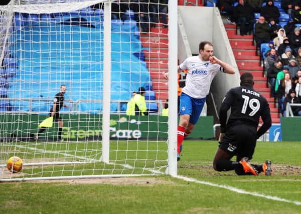 Brett Pitman scores his first goal in Pompey's match at Oldham. Picture: Joe Pepler/Digital South