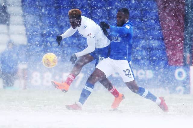 Pompey boss Kenny Jackett has praised his side for battling the snow and securing a 2-0 win at Oldham. Picture: Joe Pepler/Digital South