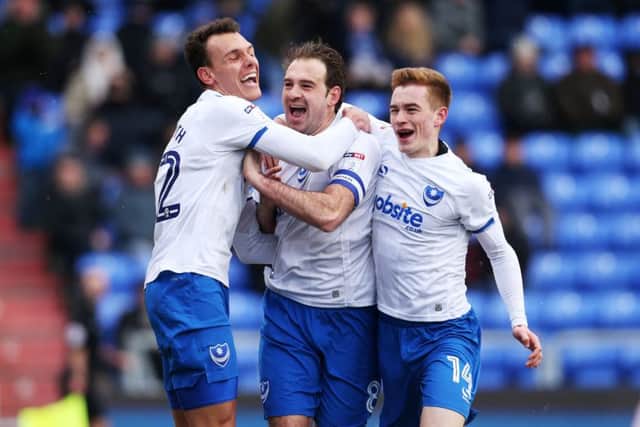 Pompey's Brett Pitman celebrates after scoring his second goal in their 2-0 win at Oldham. Picture: Joe Pepler/Digital South