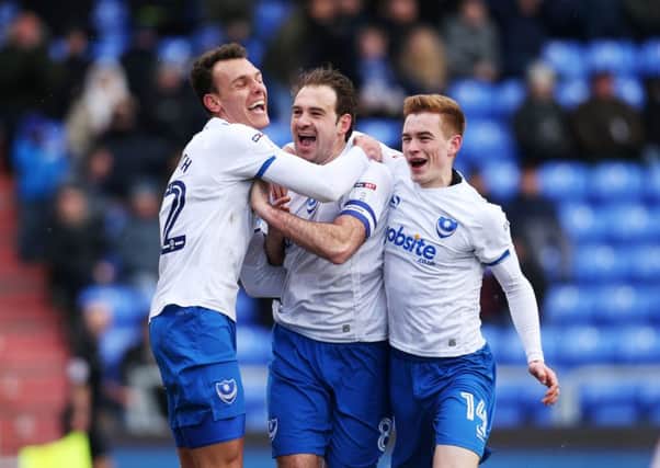 Pompey's Brett Pitman celebrates after scoring his second goal in their 2-0 win at Oldham. Picture: Joe Pepler/Digital South