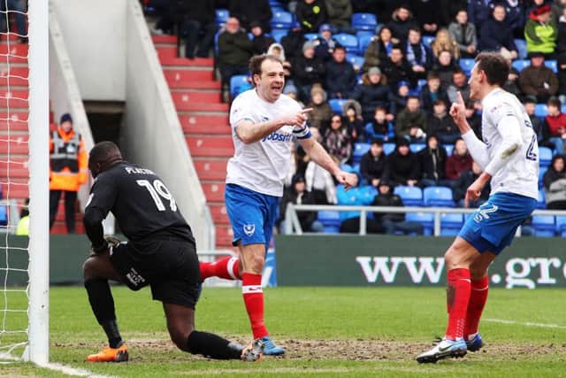 Brett Pitman marked his Pompey return with two goals against Oldham Picture: Joe Pepler