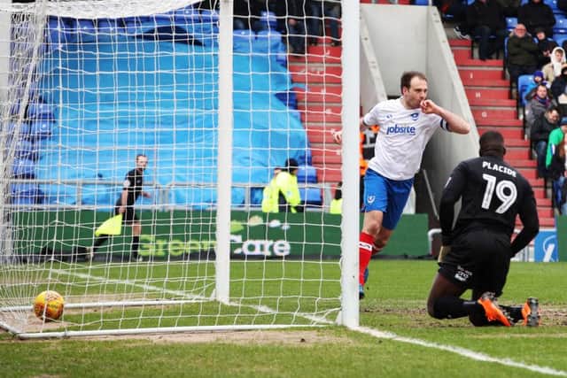 Brett Pitman celebrates his second goal at Oldham. Picture: Joe Pepler
