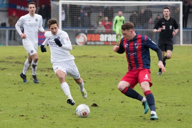 Wes Fogden drew a good save from the Hampton & Richmond keeper in a rare attempt on goal. Picture: Duncan Shepherd