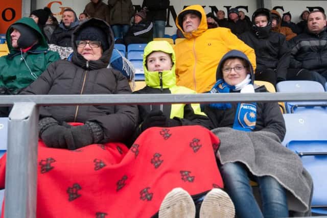 Hawks supporters were wrapped up on a chilly afternoon. Picture: Duncan Shepherd