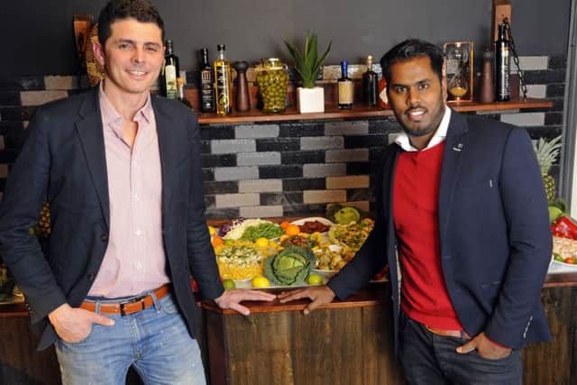 Sonairton Almeida with Achuthan Leelaratham at
Villa's Brasil Restaurant
Picture: Malcolm Wells (180314-0472)