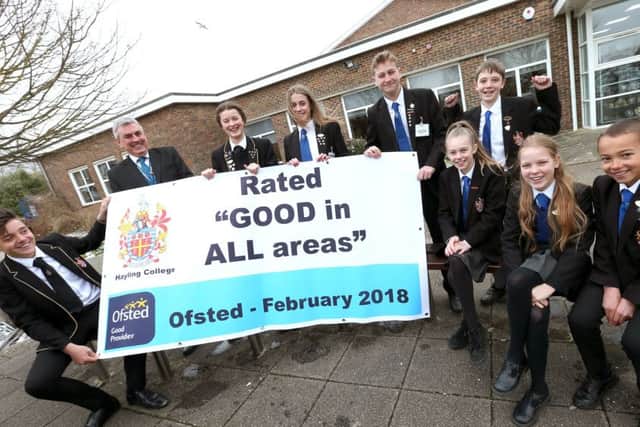 Headteacher Colin Rainford and pupils celebrate a good Ofsted report at Hayling College Picture: Chris Moorhouse